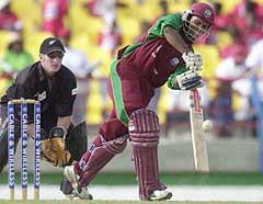 West Indies batsman Shivnarine Chanderpaul hits a boundary