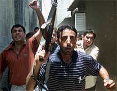 Angry Palestinians chant anti-Israeli slogans