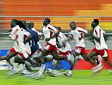 Members of Senegals team jog before training in Suwon. Senegal face Uruguay in group A in their final match of the first round of the World Cup on Tuesday.