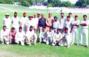 The Tilak Nagar Colts team, winner of opening match of the DDCA Hot Weather Cricket Tournament, with DDCA sports secretary Sunil Dev at Ferozeshah Kotla ground.