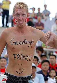 A Danish fan reacts prior to the game