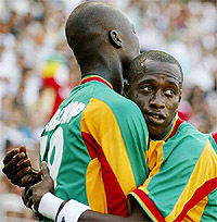 Senegals Papa Bouba Diop celebrates scoring 