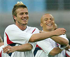 England's captain David Beckham smiles as