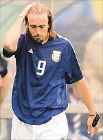 Argentinas team captain Gabriel Batistuta walks away