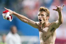 USAs Frankie Hejduk celebrates as the team advances to the second round