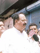 Health Minister A. K. Walia visiting the shop in Lakshmi Nagar where a fire injured four persons