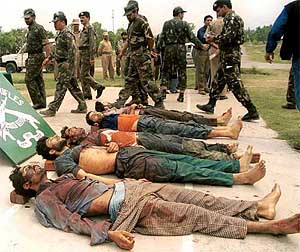 The bodies of three militants and two civilians