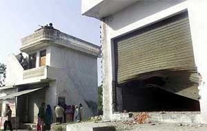 A damaged shop due to Pak shelling in Palanwala town 