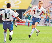 Brian McBride of the USA celebrates his first goal