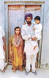 Taranjit Singh with his parents in his present birth
