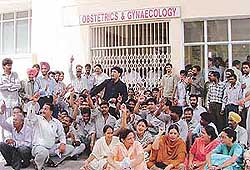 Employees of Dayanand Medical College and Hospital protest against the hospital management in Ludhiana