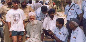 Indian Air Force officials make inquiries from villagers