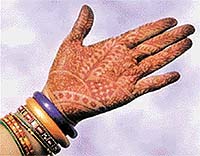 Mehndi designs can be intricate, covering the entire palm