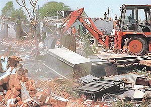 Demolition drives have become a part of everyday life in city slums --- Photo by Pankaj Sharma