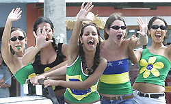 Brazilian fans dressed in the country's national colours
