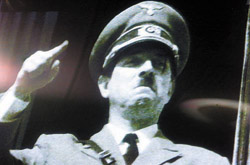 Comedian Rik Mayall plays the part of Adolf Hitler