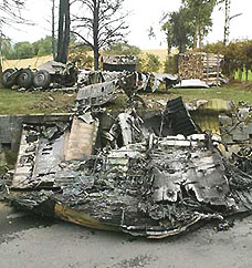 Parts of the wreckage of a Tupolev 154 is seen after a plane crashed in the southwestern German village of Owingen on Tuesday.