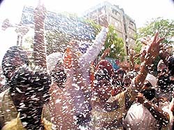 Joyous supporters of the Tohra group, after it won 27 seats in the 46-member DSGMC.