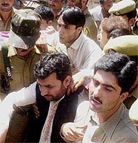 JKLF leader Javed Ahmad Mir being taken into custody