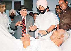 The Punjab Governor, Lieut-Gen J.F.R. Jacob (retd), visits the PGI to enquire about the health of Kultar Singh,