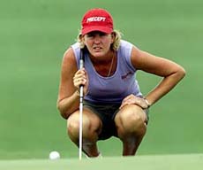 Shani Waugh of Australia waits to putt on the final hole