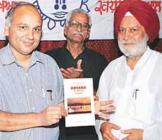 The Head of the PGI Department of Internal Medicine, Dr D.R. Vij (left), releases ‘Transcending Sorrow Through Dhayana