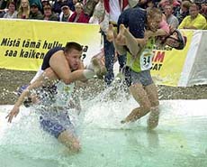 Anna Zilberberg and Meelis Tammre of Estonia race Finlands Elina Toivonen and Ilpo Haalisto 