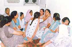 Relatives console Ritikas mother Saroj Malik