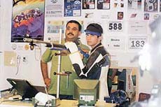 Olympian Abhinav Bindra at his residence shooting range along with his trainer Amit Bhattacharjee.