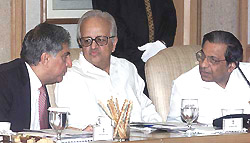 RBI Governor Bimal Jalan with industrialist Ratan Tata and Planning Commission Member N. K. Singh
