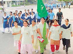 Children take part in a race organised on the occasion of World Population Day in Sector 16, Chandigarh, on Thursday.