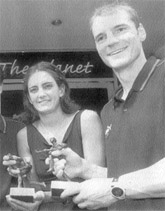 German hockey captain Florian Kunz (left) with Argentinas Luciana Aymar, both adjudged best players of 2001 by the FIH.