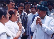 Haryana Chief Minister Om Parkash Chautala consoles Capt Atul Somra's mother