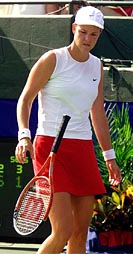 Lindsay Davenport of the USA tosses her racket after missing a shot