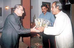 Mr N. K Khanna, president of Chand Khanna Cricket Club, felicitating Board of Control for Cricket in India president Jagmohan Dalmia in the Capital.
