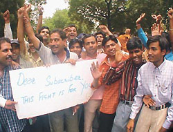 Cable operators demonstrating in support of their demands at Jantar Mantar in the Capital on Wednesday.