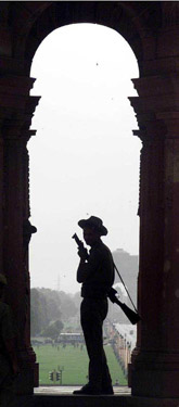 Security personnel stands guard