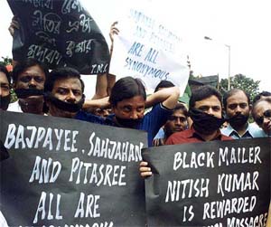 Trinamool Youth Congress activists protest against the bifurcation of the Eastern Railway