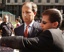 Former WorldCom Financial Controller David Myers is led by a federal agent