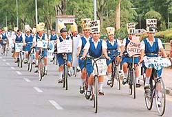 Schoolchildren participate in the save water campaign cycle rally