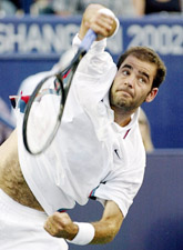 Pete Sampras of the United States serves to Tommy Haas