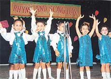 Kids participate in Songs and Rhymes Day