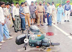 A woman riding pillion on this scooter died when a speeding truck hit the vehicle near the traffic lights of Sector 28 and the Industrial Area, in Chandigarh on Sunday.