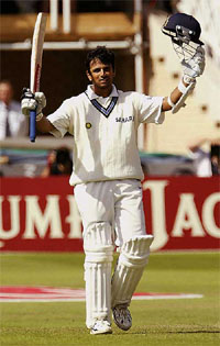 India batsman Rahul Dravid celebrates reaching his century