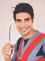 Rajat, with his Kingfisher Face of the Year-2002 trophy.