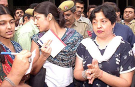 Mrs Madhu Sharma, wife of Mr Ravi Kant Sharma, and their daughters talk to newspersons 