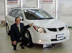 Toyota Motor Corp President Fujio Cho unveils the new VOLTZ