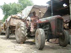 A Massey Ferguson tractor bought by the Amritsar Municipal Corporation in 1962 collects garbage in Amritsar.