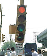 Twilight Zone: Nonplussed motorists dont know whether to stop or to go at this crossing. 
