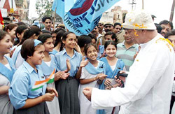 Congress leader and film actor Sunil Dutt with schoolchildren